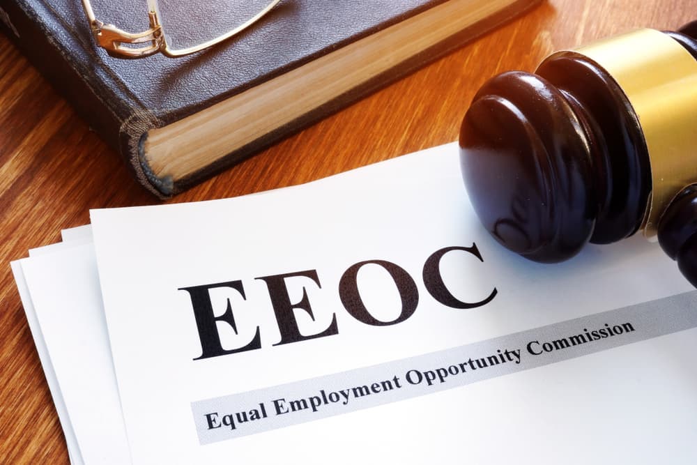 EEOC equal employment opportunity commission report and gavel.