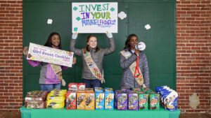 Girl Scouts selling cookies in San Diego supporting troop programs